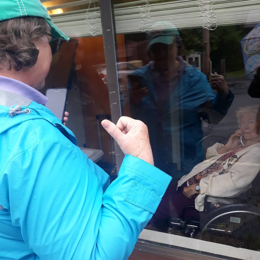 Mom & Ma through the window at the nursing home