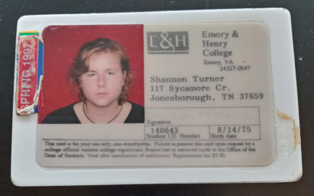 A young white woman's college ID