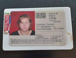 A young white woman's college ID